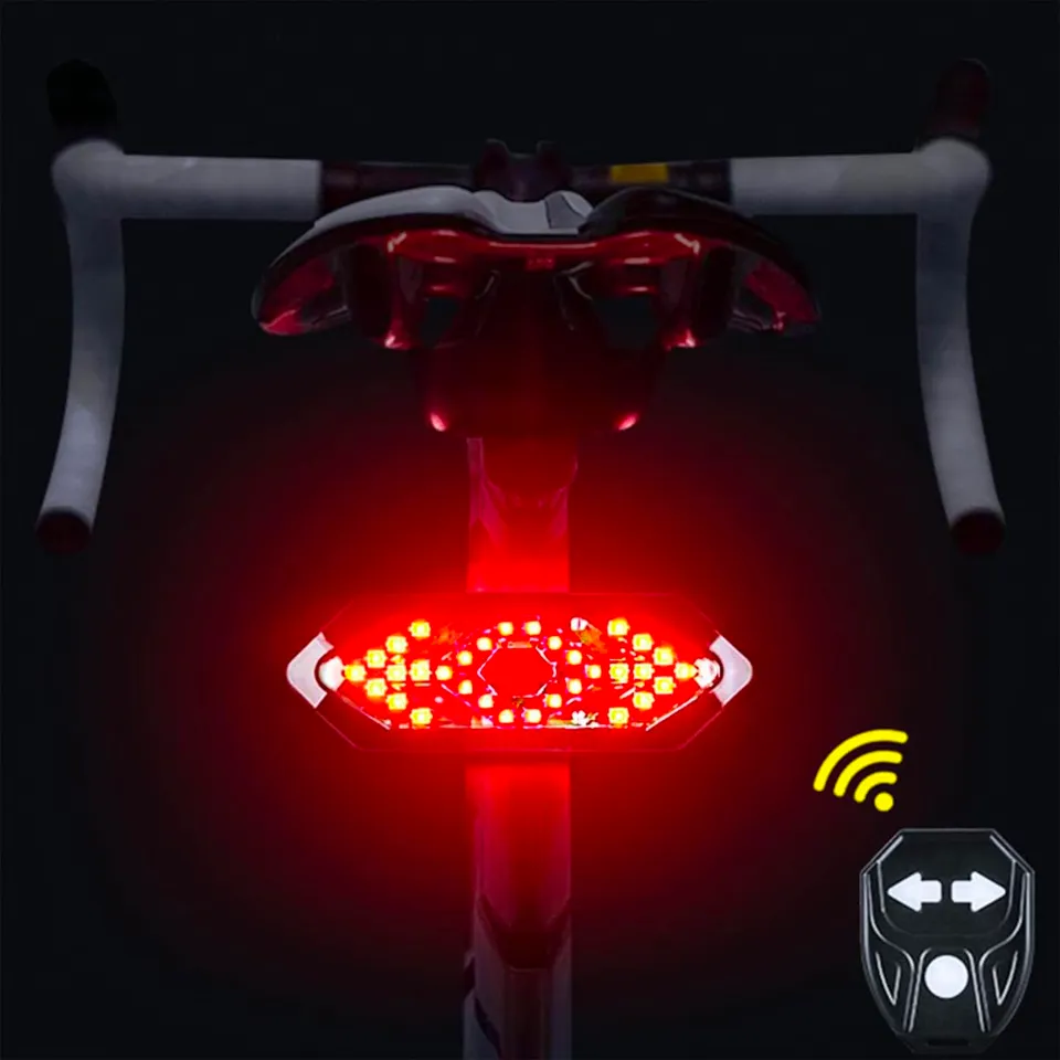 NK luce posteriore bici LED con frecce e telecomando USB